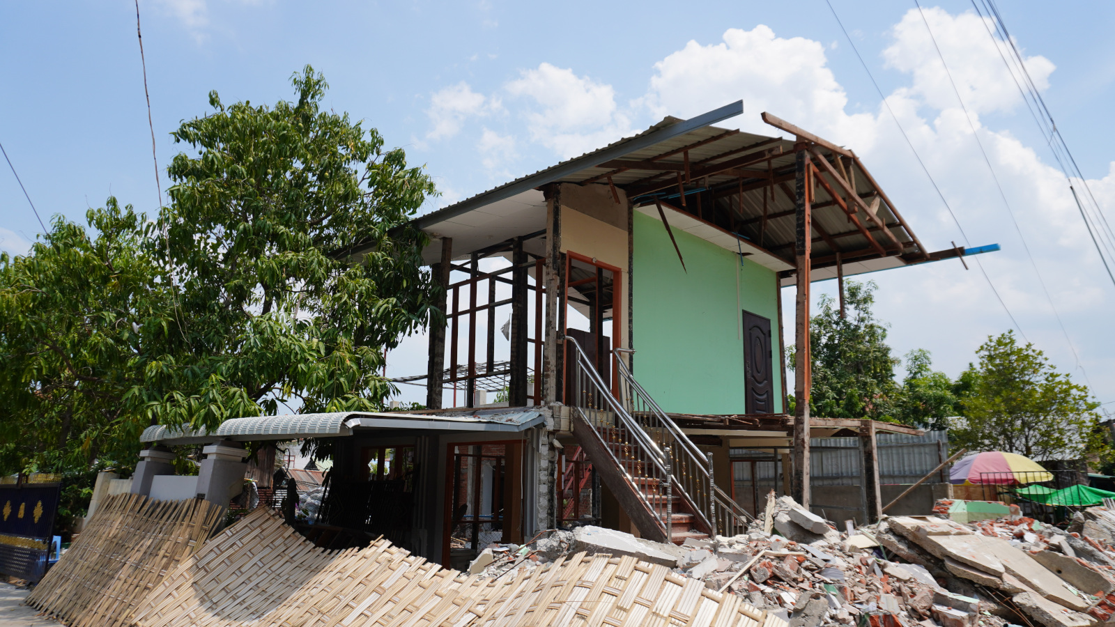 Disbursing installment for enabling houseowners to reconstruct transitional shelters